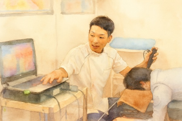 首まわりの状態を機器を使って確認している検査の様子のイラスト
